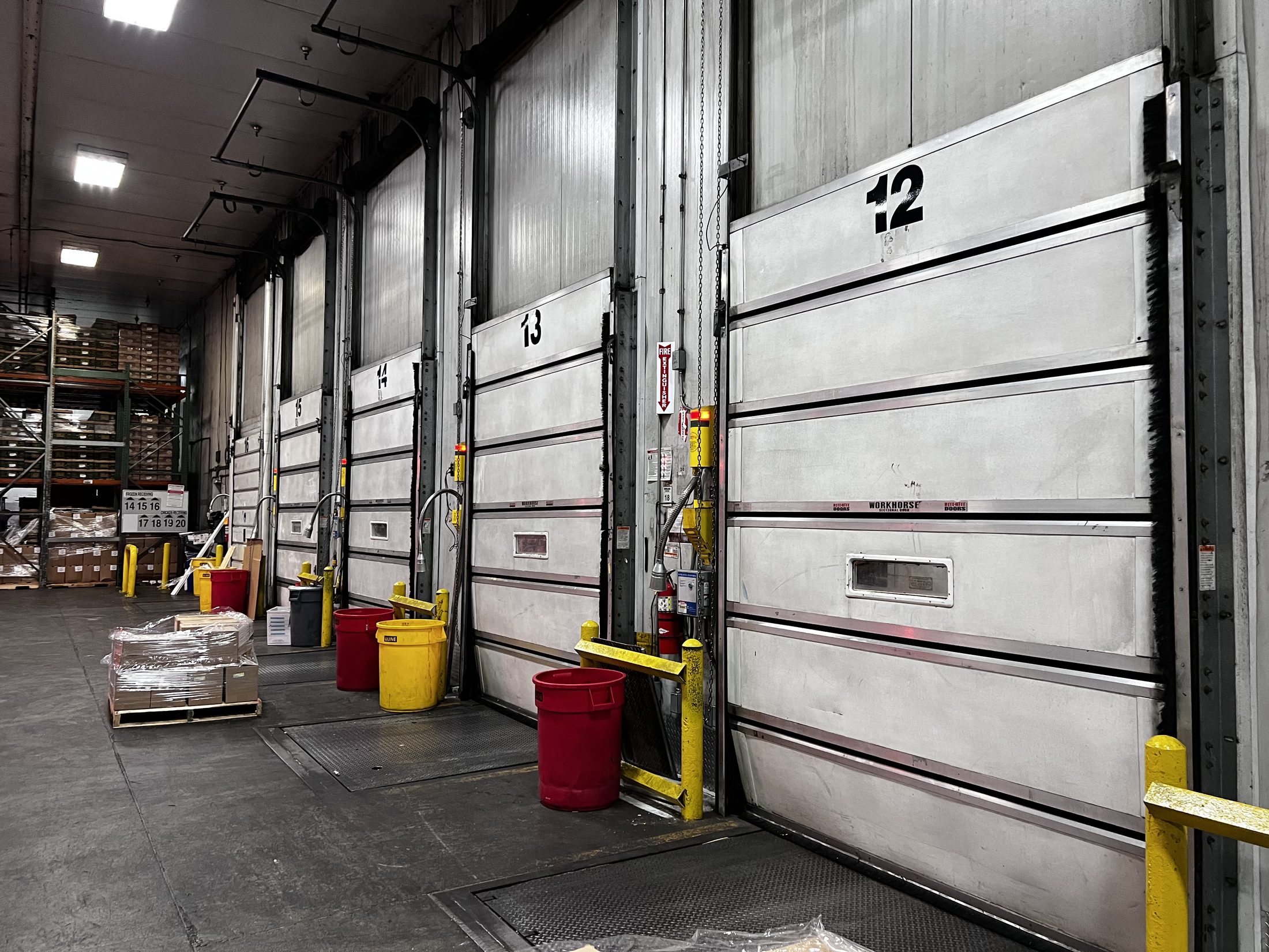 Industrial loading area representing PrimeSite guidance on door dock and gate service decisions