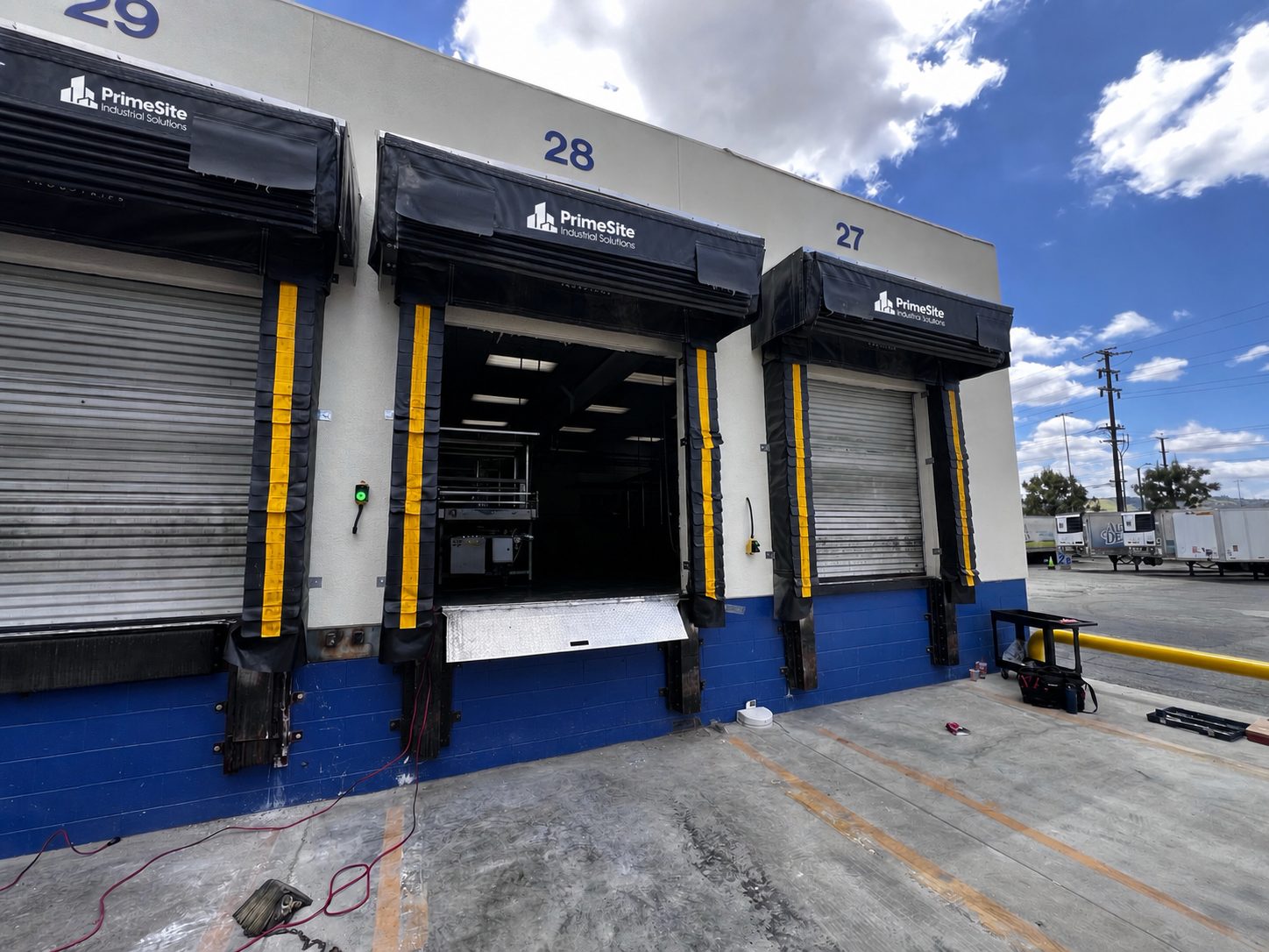 Industrial loading dock bays where a dock leveler failure can disrupt loading operations