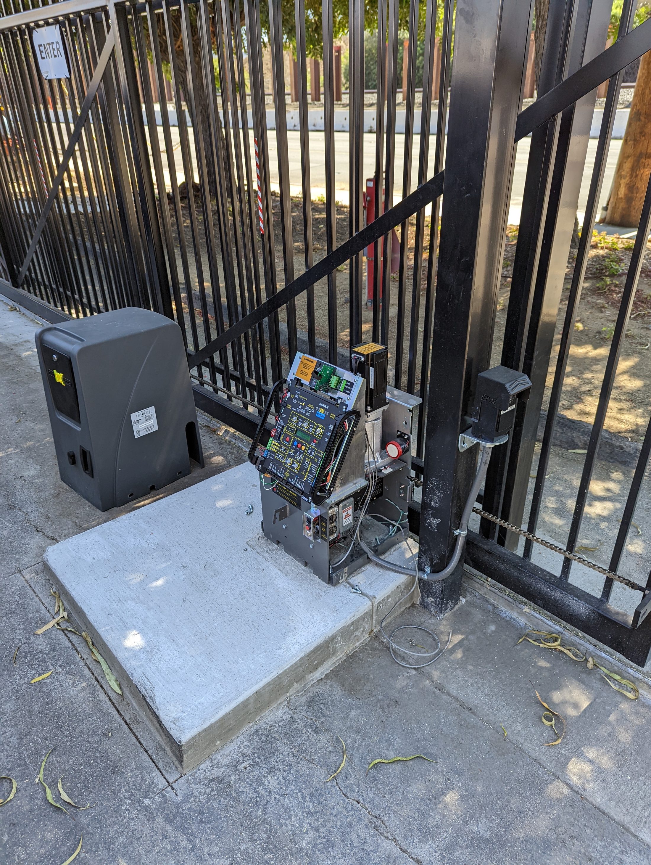 Commercial gate operator at an industrial property entrance