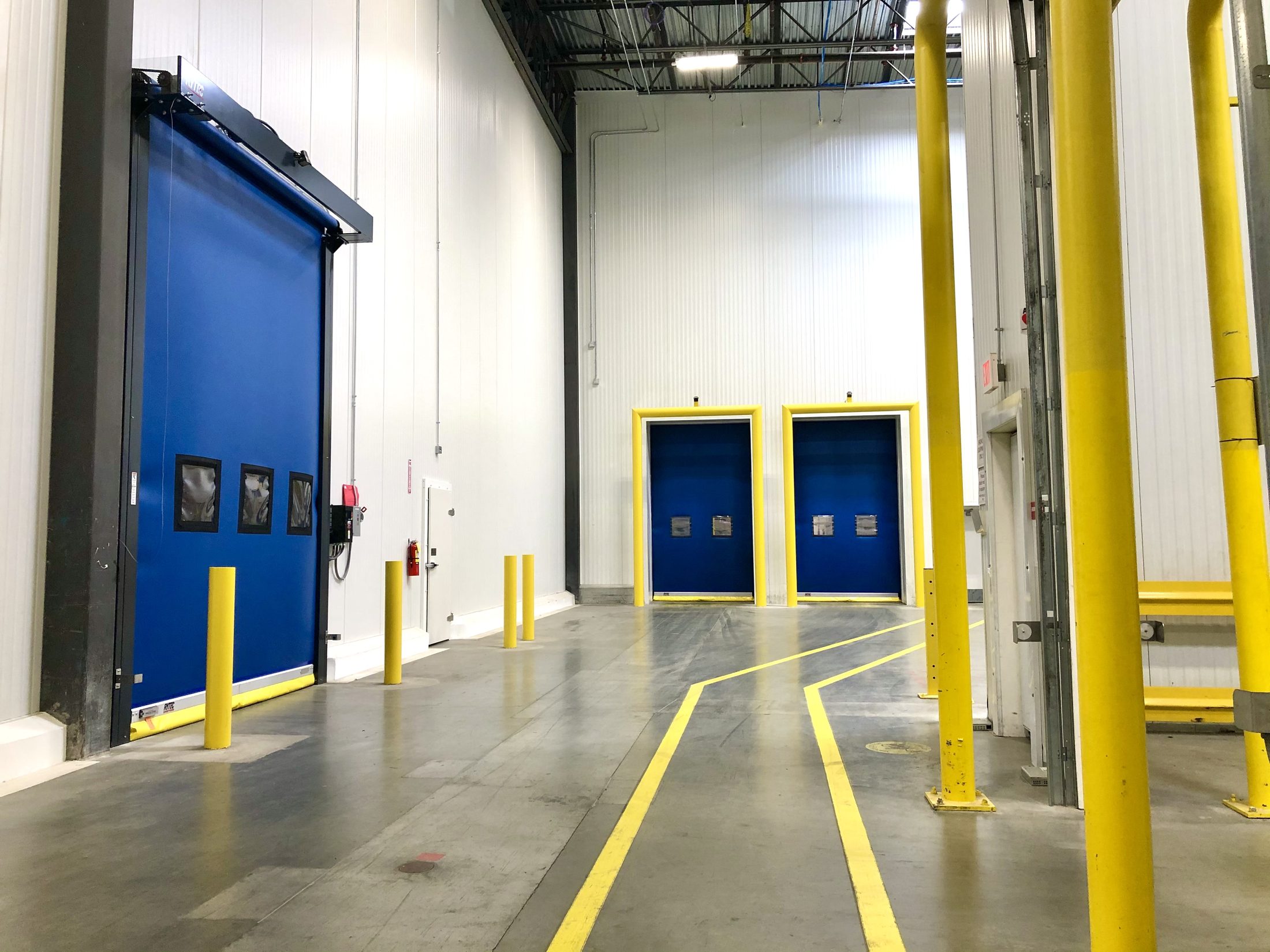 High-speed doors in a clean industrial facility