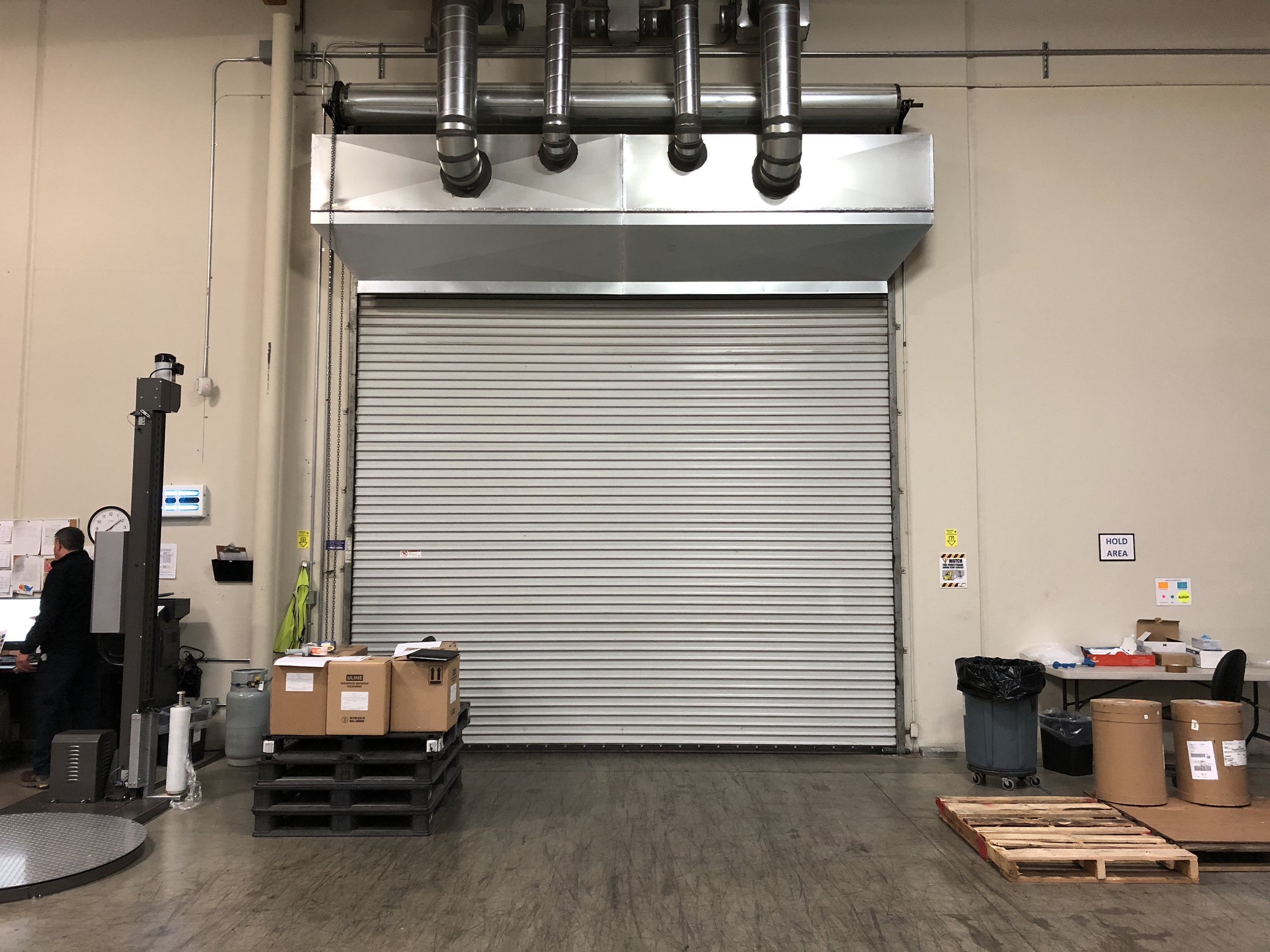 Commercial overhead door equipment inside an industrial facility