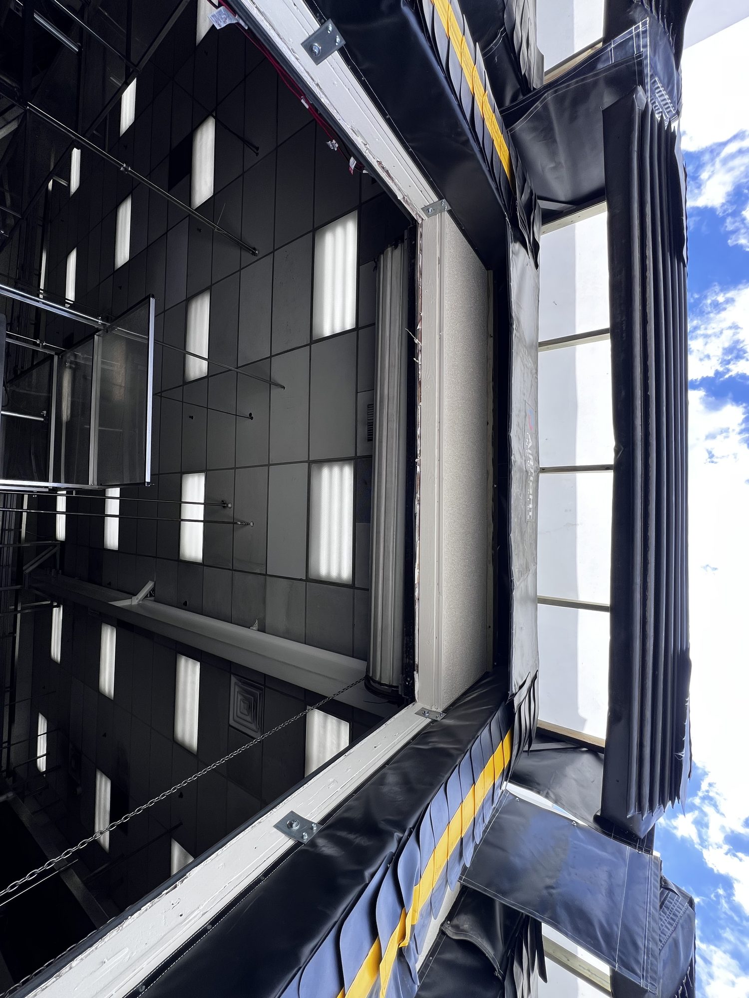 Interior view of loading dock equipment and dock door structure